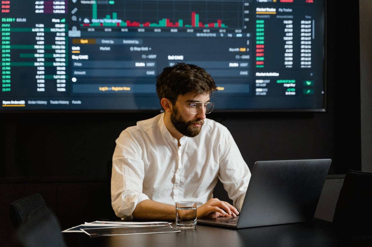 a man analyzing stocks