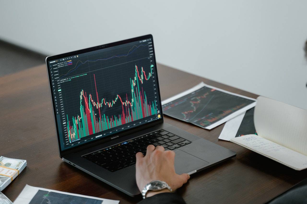 a person working on analysis with his laptop